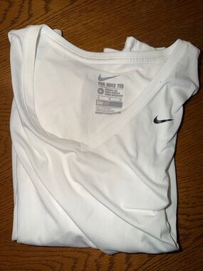 Nike Women's White Dri-FIT Long Sleeve Top with Black Swoosh